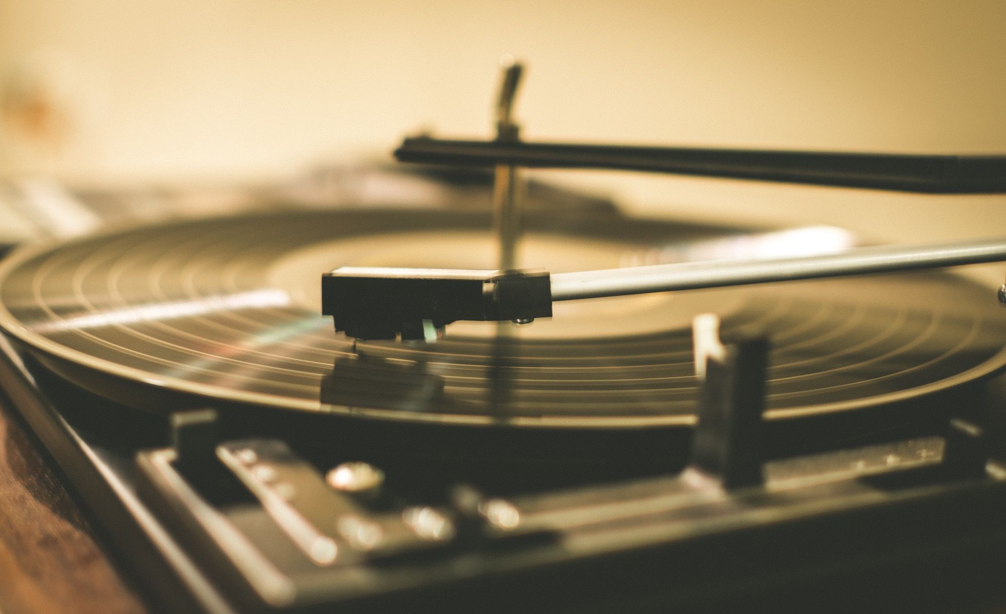 listening to music record player close up