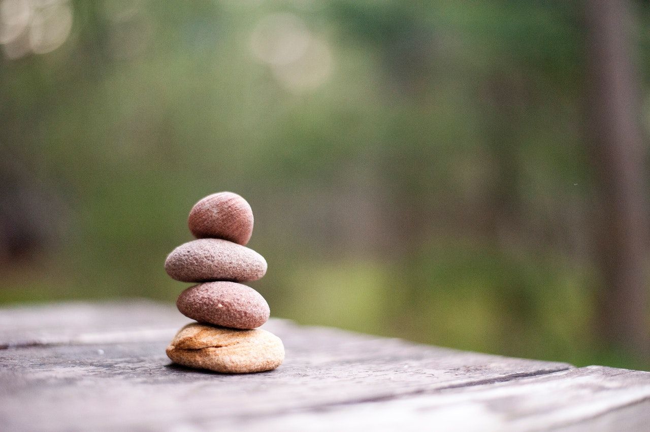 Balance and mental health rocks stacked in balance