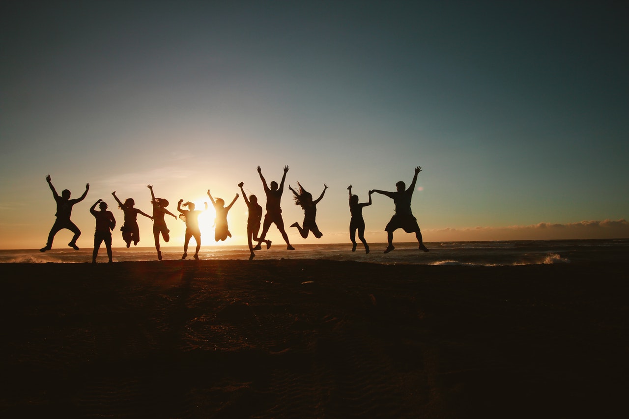 medical students celebrating on the beach