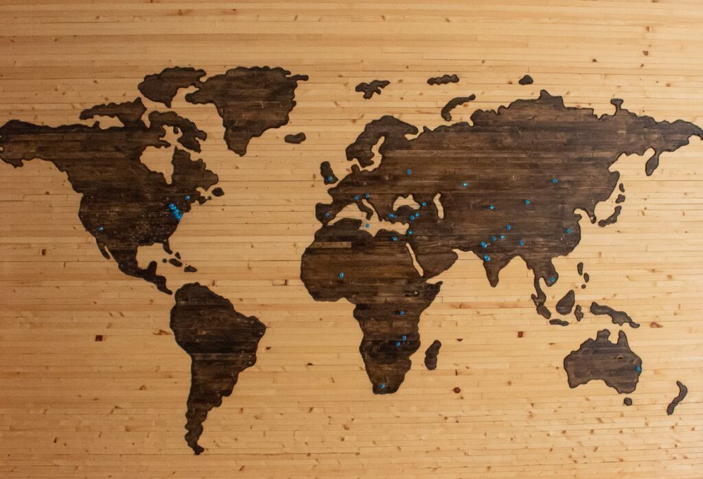 brown and black 2-D map of globe