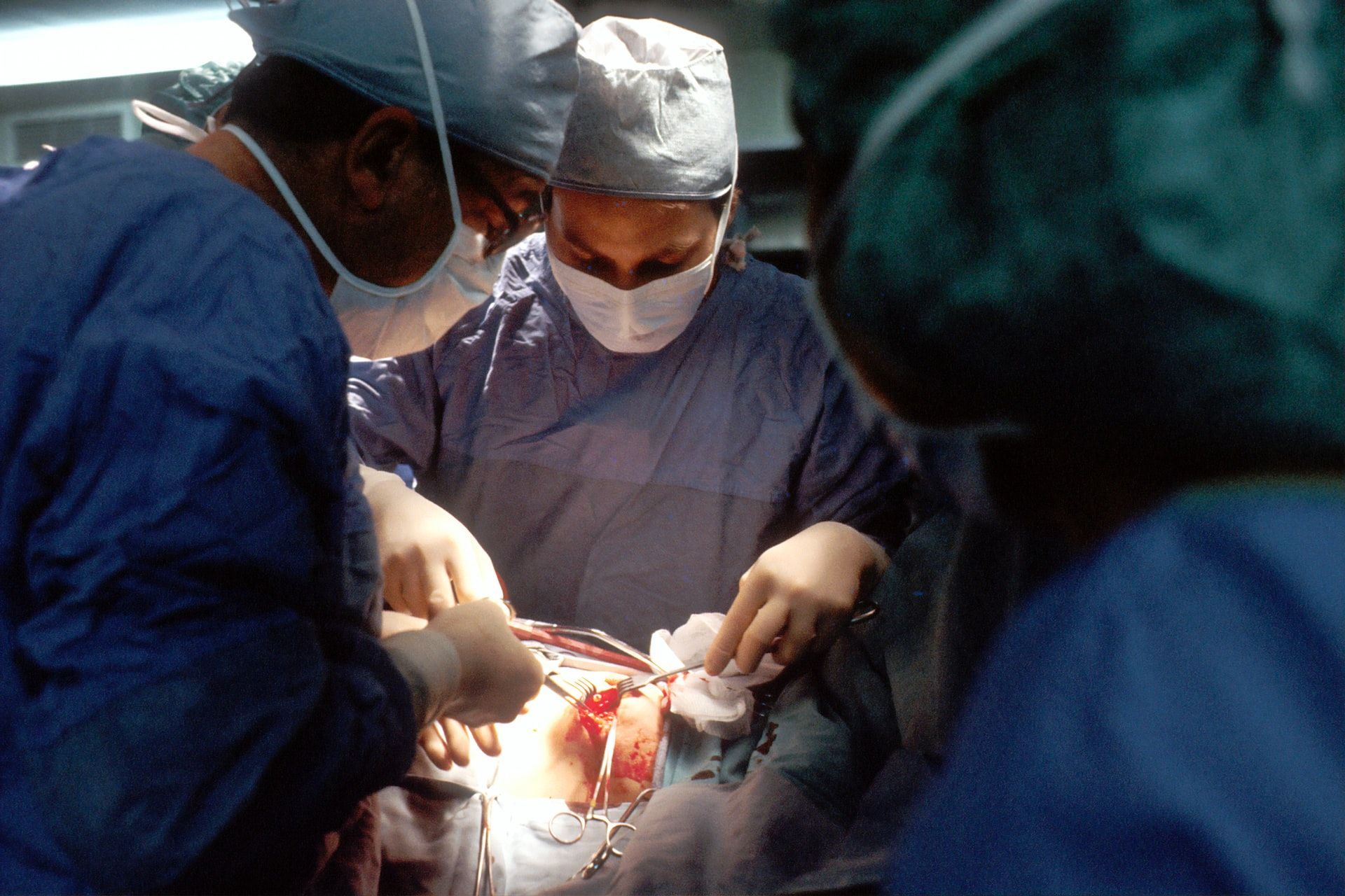 A group of surgeons performing surgery