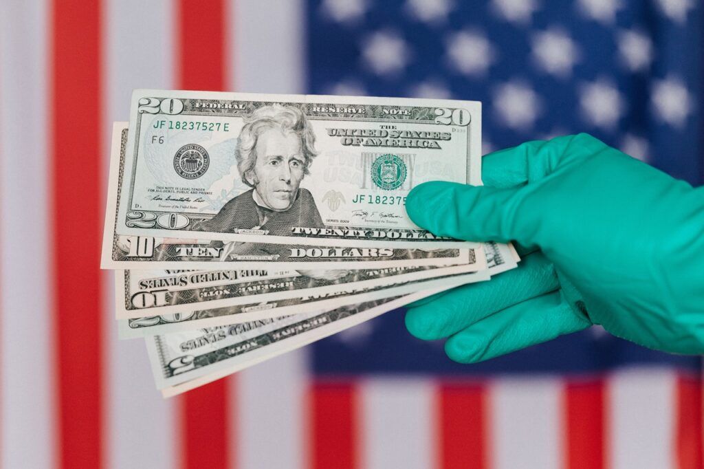 Doctor holding money