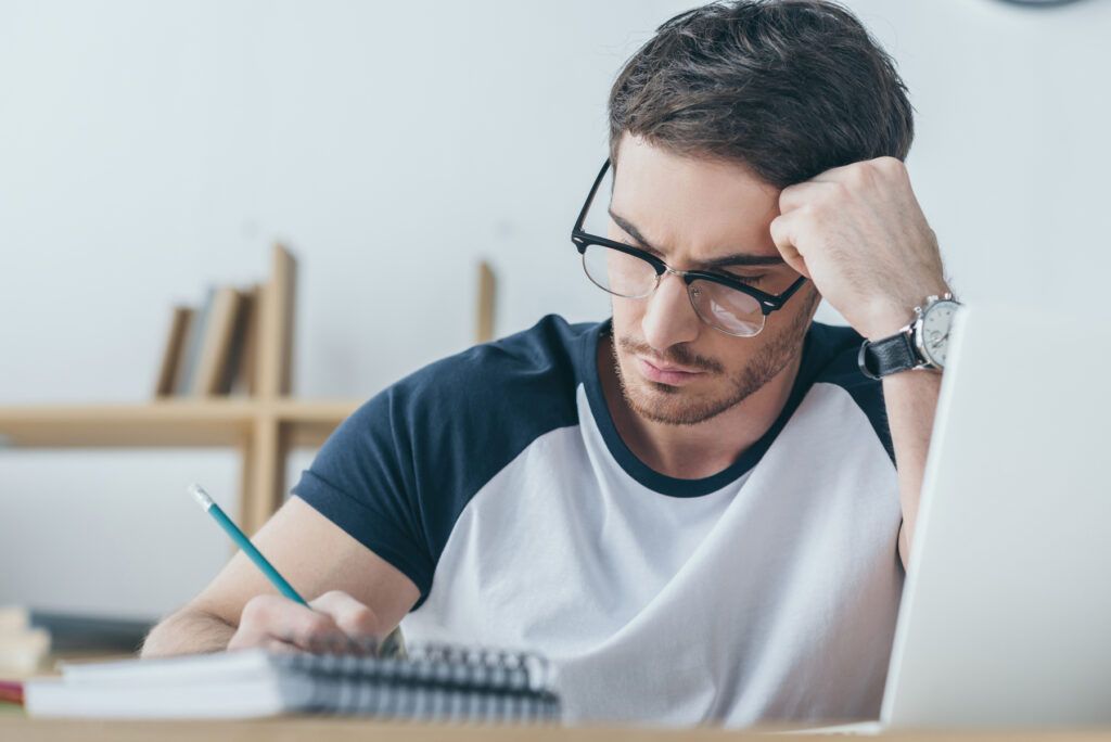 Male student studying - What I Wish I Knew Before USMLE Step 2 CK