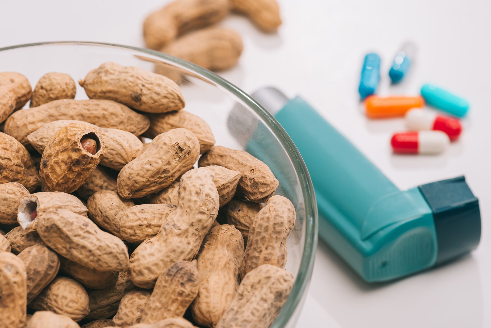 Allergist Immunologist - bowl of peanuts, pills, and inhaler
