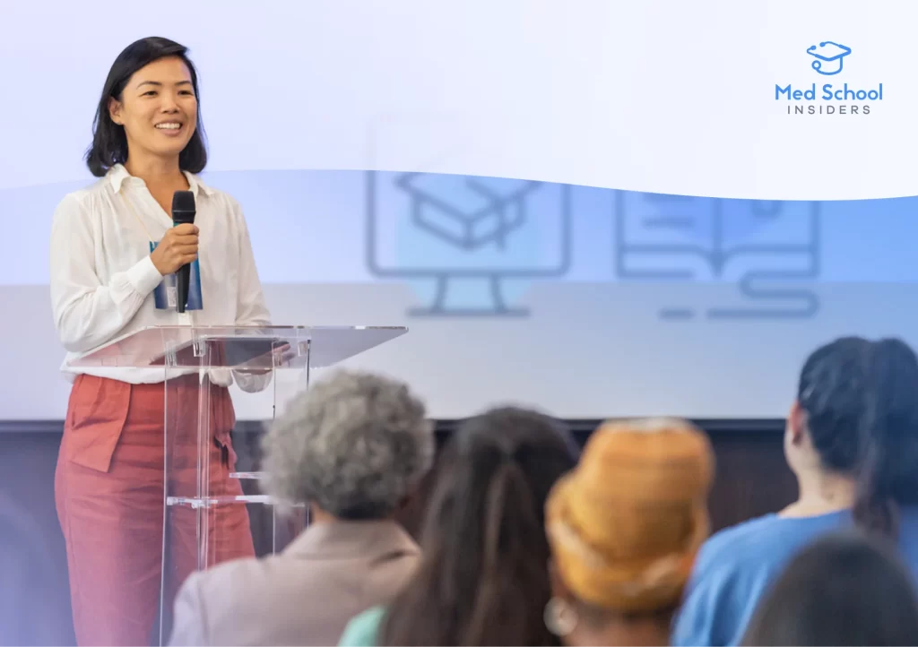 Asian woman speaking at a medical confernece