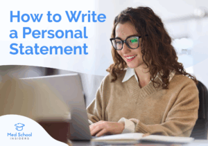Student smiling while typing on a laptop as she writes a medical school personal statement