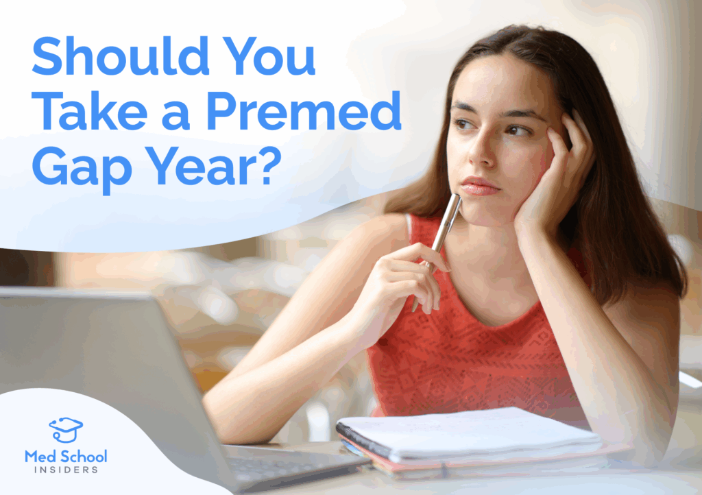 A stressed pre-med student sitting at a desk with textbooks and a laptop thinking