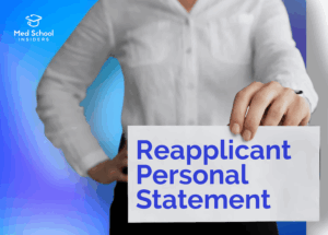 Medical school reapplicant holding a sign while preparing a new personal statement