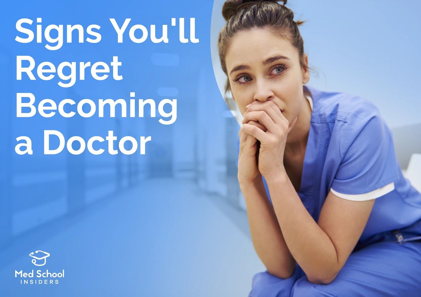 Female healthcare professional in blue scrubs sitting with hands clasped, looking concerned.