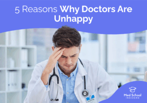Doctor looking stressed and overwhelmed at work illustrating reasons why many physicians experience burnout and dissatisfaction