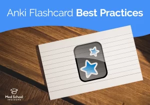 A lined index card displaying the Anki app icon resting on a wooden surface, beneath the text 'Anki Flashcard Best Practices.' Med School Insiders logo in the bottom left corner